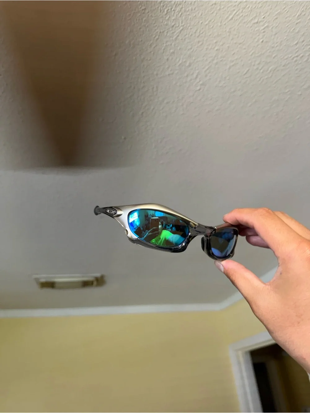 Silver Frame Sunglasses with Blue Mirrored Lenses Oakley